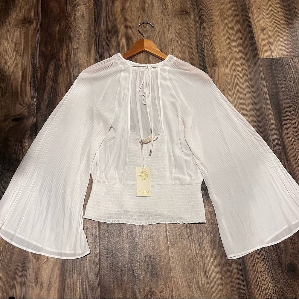 NWT- Ramy Brook White Blouse with pleated bell sleeves and smocked waist.
